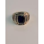A stamped 9ct blue stone ring, inscribed WCS LEADERS CLUB 1357, ring size V, approx. weight 14.