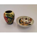 A small Moorcroft vase and bowl. Vase height 9 cm.