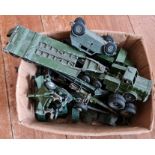 A collection of Dinky and Corgi military vehicles unboxed.