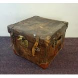 An Allen brown leather square trunk with brass lock.