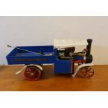 A Mamod steam wagon blue red and cream.
