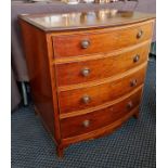 A small bow front mahogany four drawer chest. 70 cm.