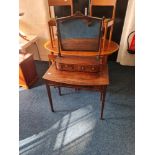 A 19th century mahogany side table with a mahogany two drawer swing mirror.