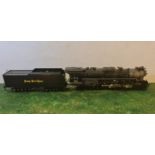 An Aster Hobby live steam Nickel Plate Road 779 Berkshire gauge 1 model train and tender and