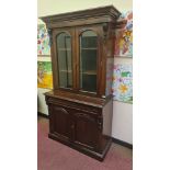 A good quantity mahogany reproduction bookcase with two glazed doors to top and cupboard base in the