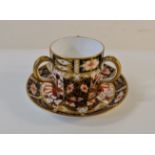 A Royal Crown Derby Imari three handled coffee cup and saucer 2451.
