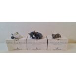 Three Royal Copenhagen cat figures boxed.