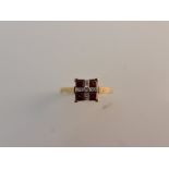 A stamped 10k gem stone ring of square design, ring size N, approx. weight 2gms