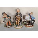 Three Capodimonte figure groups.