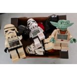 Five Lego Star Wars Alarm clock figures two Lego super heroes and Lego figure.