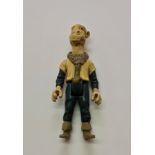 A Star Wars 1985 Yak face action figure.