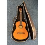 An Alhambra mod. 3 C acoustic guitar in case.