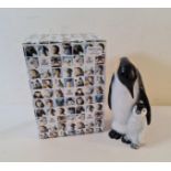 A large Royal Copenhagen penguin figure in box.