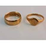 A hallmarked18ct yellow gold wedding band, ring size K1/2, with a hallmarked 18ct yellow gold