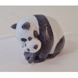 A Royal Copenhagen panda and cub figure.