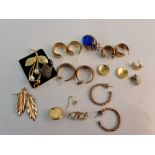 Three pairs of yellow metal hoop earrings, two pairs of hoop earrings, with a ring, brooches etc