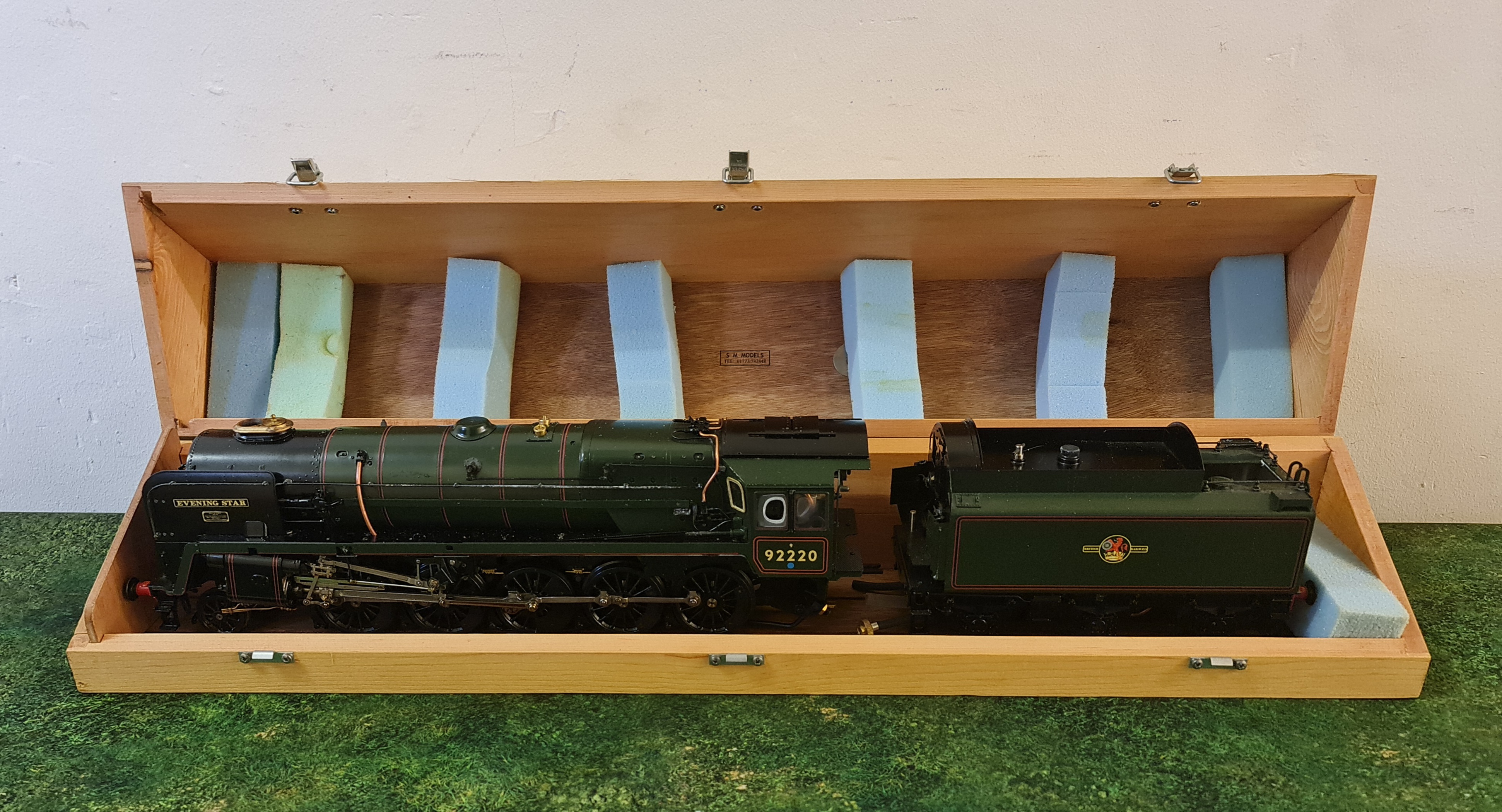 An Aster Hobby live steam Evening Star 92220 gauge 1 model train and tender with wooden travel box