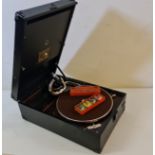 A His Master’s Voice black cased gramophone with chrome interior arm needle outfit box and needs.