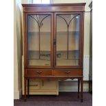 A Edwardian mahogany two door glazed display cabinet.