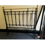 A reproduction brass and black painted 4’6 bed frame.