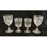 Two pairs of engraved 19th century wine glass.