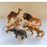 Six Beswick animal figurines lions, tiger, and elephant.