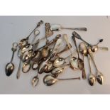 A quantity of various spoons, some hallmarked silver
