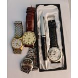 Three various Gent's wristwatches with a wristwatch and pen set