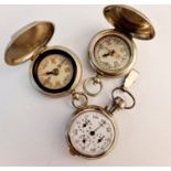 A Pedometer and two compass’s.