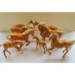 Eight Beswick horses palomino.