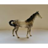 A Beswick horse rocking horse grey. Crazing on glaze throughout.