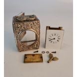 A silver Goldsmiths clock case and clock. As seen.