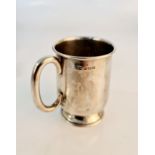 A hallmarked silver tankard, approx. height 8cms