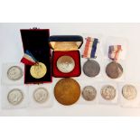 Various coins to include two George V half crowns, Churchill coin, Queen Victoria half crown, George