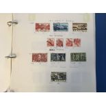 A collection of mainly modern Swiss mint and used stamps and F.D.C.’s in 4 volumes.