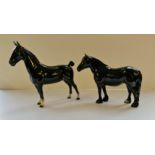 Two Beswick horses gloss black.