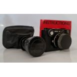 A Leica CL Leitz Wetzlar camera body with two lenses Elmar-c 1:4/90, and Summicron-c 1:2/40. (Damage