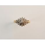 A 9ct gold diamond cluster ring of 24 diamonds - approx 0.5 total carat weight.