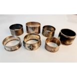 Seven various napkin rings, some hallmarked silver