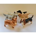 Six Beswick dog figurines.