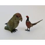 A bronze cold painted green parrot together with a bronze cold painted pheasant.