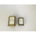 Two brass carriage clocks height of tallest 15 cm.