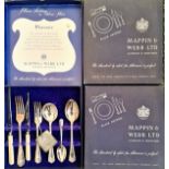 Four boxed Mappin & Webb place settings