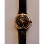A ladies stainless steel Bulova Accutron wrist watch, the brown dial having hourly Arabic
