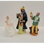 Three Royal Doulton figures Blue Beard, Punch and Judy Man, and Gift of Love.