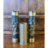 A pair of WW1 trench art shell cases 75 DEC 18, together with a German DEZ 1917 shell.