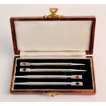 A set of four silver Bridge pens in box