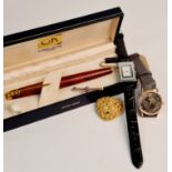 A Lady's Pierre Cadin wristwatch, a Lady's quartz wristwatch together with a yellow metal gem