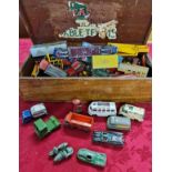 A wood box containing a collection of Lesley diecast cars vans etc.