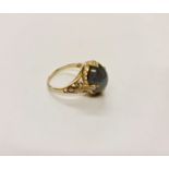 A stamped 16k blue moonstone stone and diamond ring, ring size M,